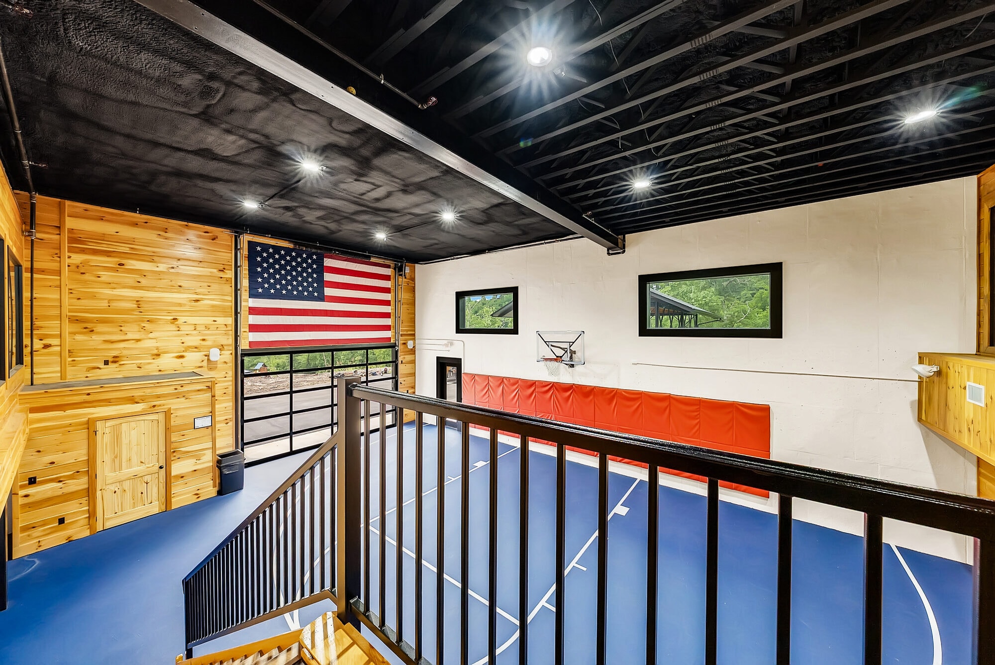 Excalibur basketball court overhead mezzanine view American flag full court