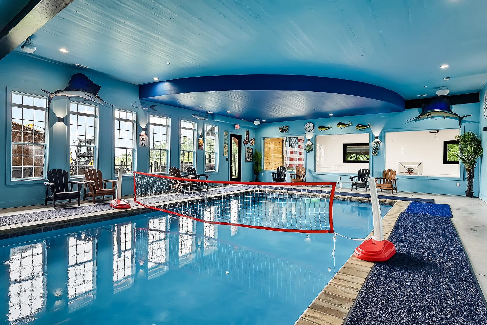 Excalibur 16x46 ft indoor heated pool with volleyball net, Smoky Mountains luxury lodge