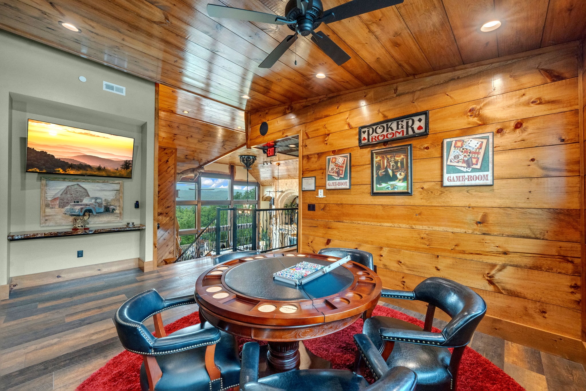Close-up of Excalibur poker table with chip case, King and Queen card art on cedar walls