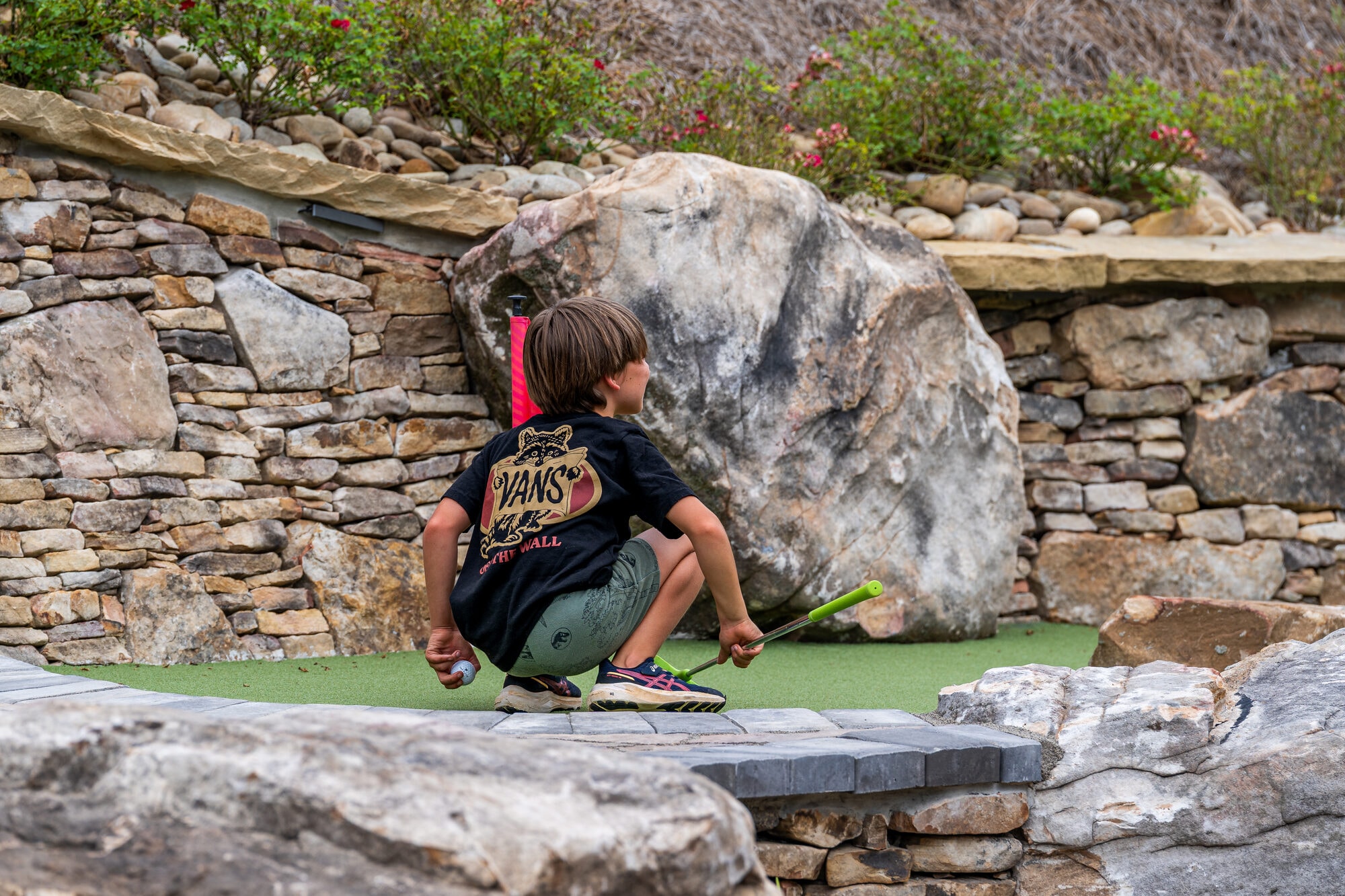 Excalibur putt-putt course natural stone waterfall landscaping boulder features