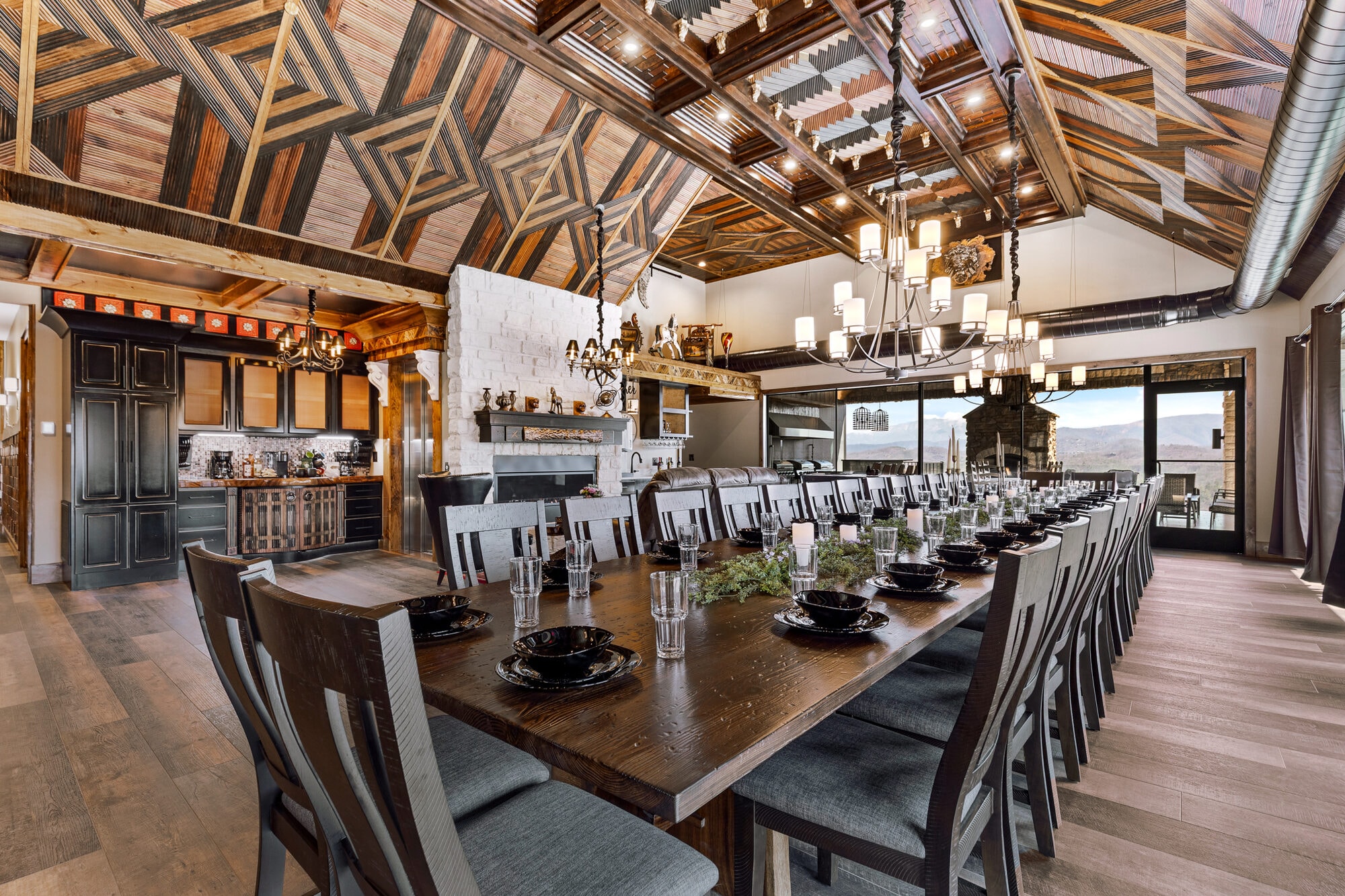 Luxury dining hall with geometric ceiling, long table corporate dinner