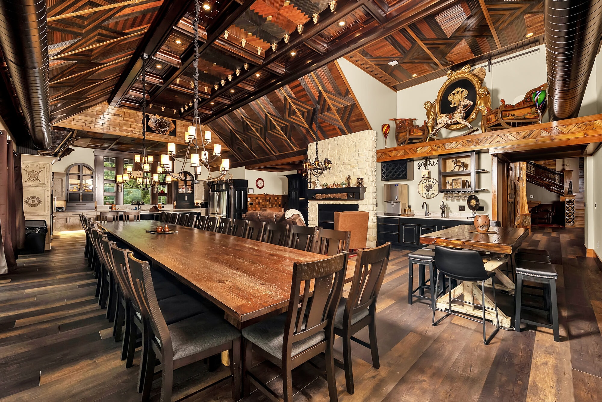 Rustic open concept kitchen dining great room, large group dining